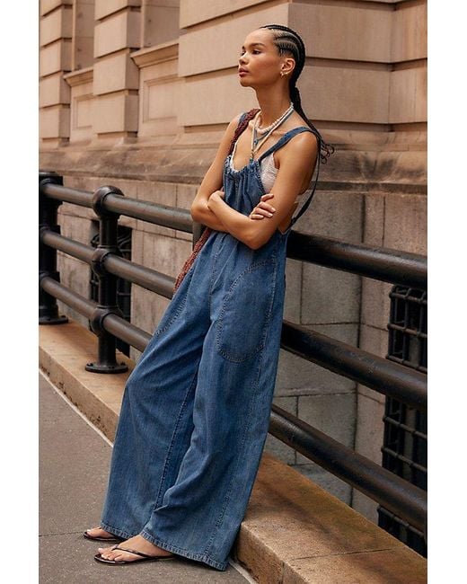 Denim jumpsuit (with red straps)