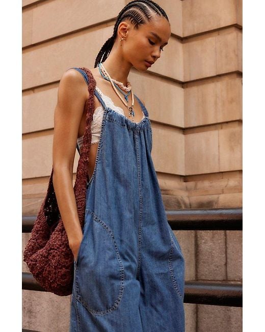 Denim jumpsuit (with red straps)