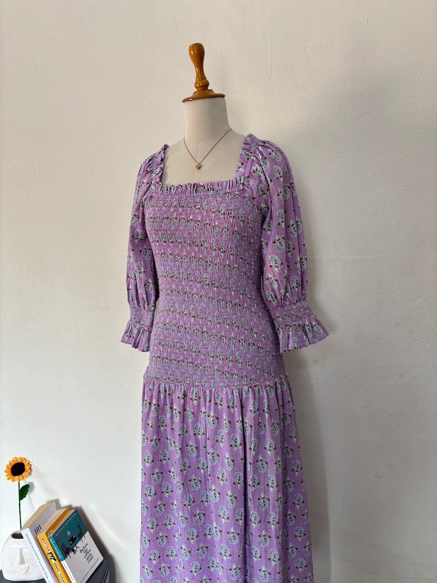 Purple smocked drop waist paisley print maxi dress.
