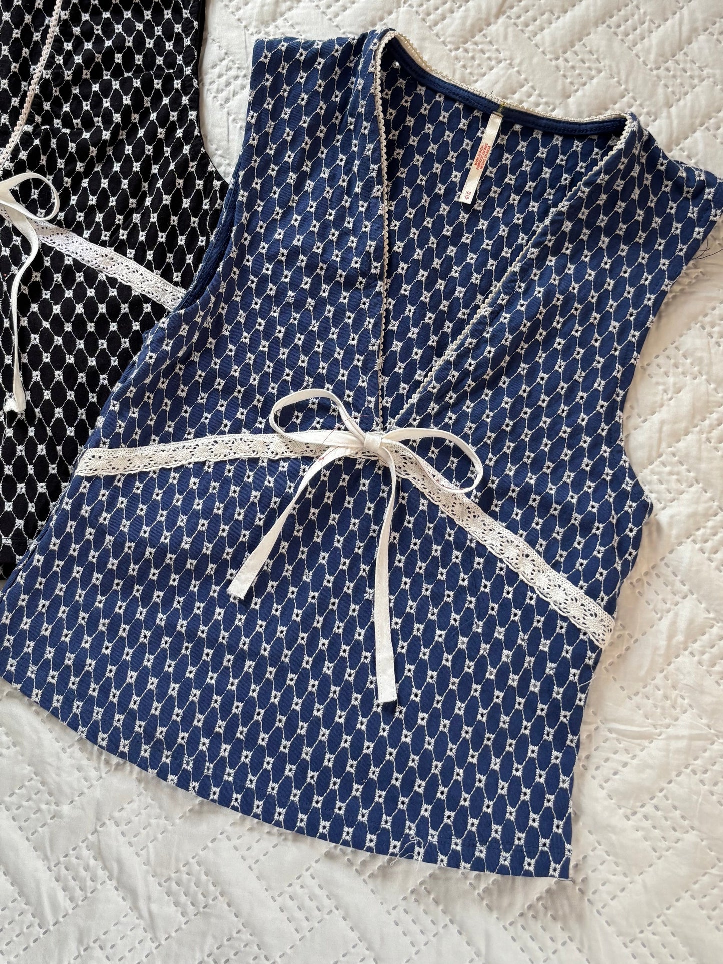 Blue embroidered top with lace work
