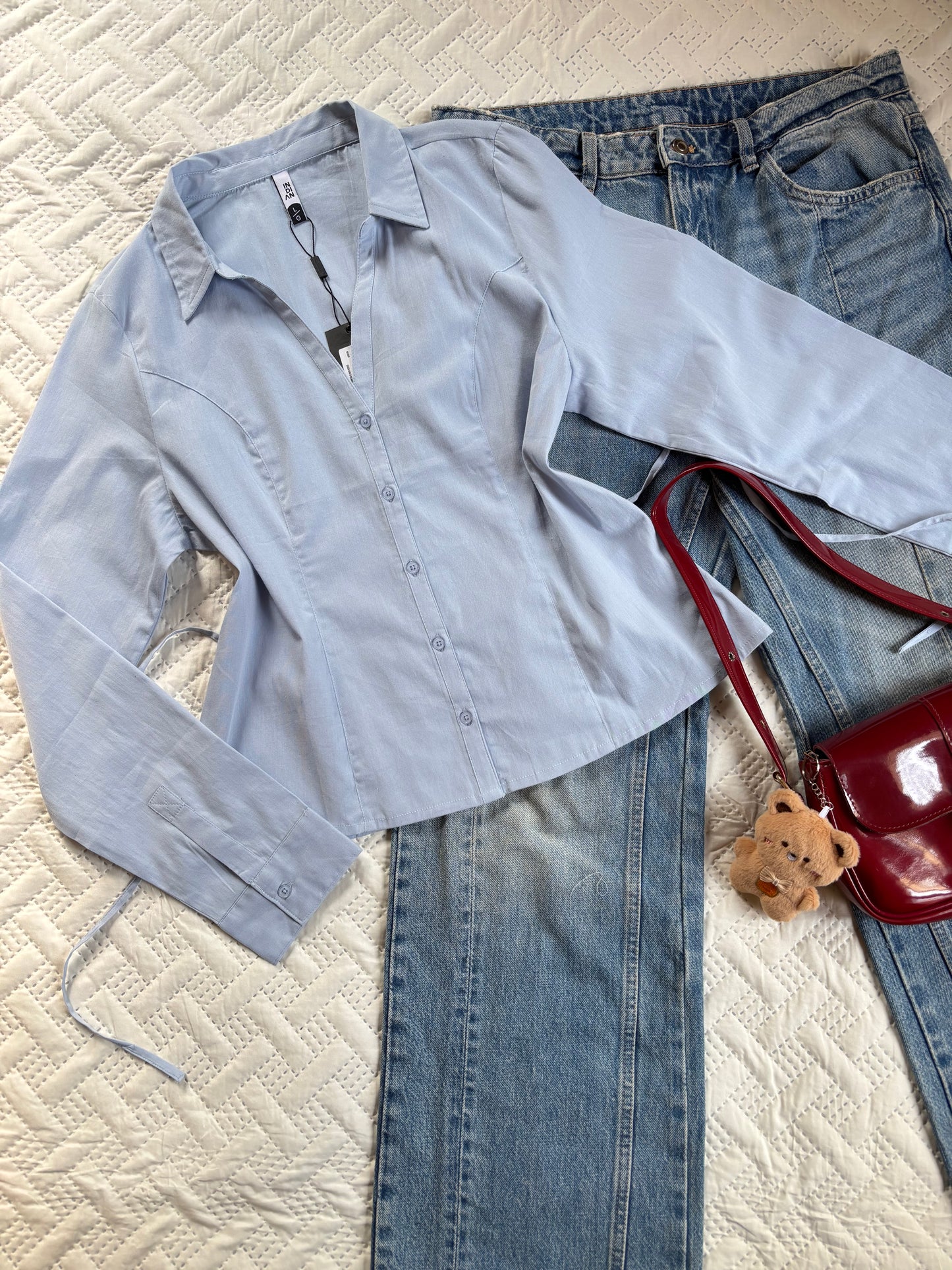 Mia powder blue shirt with back tie