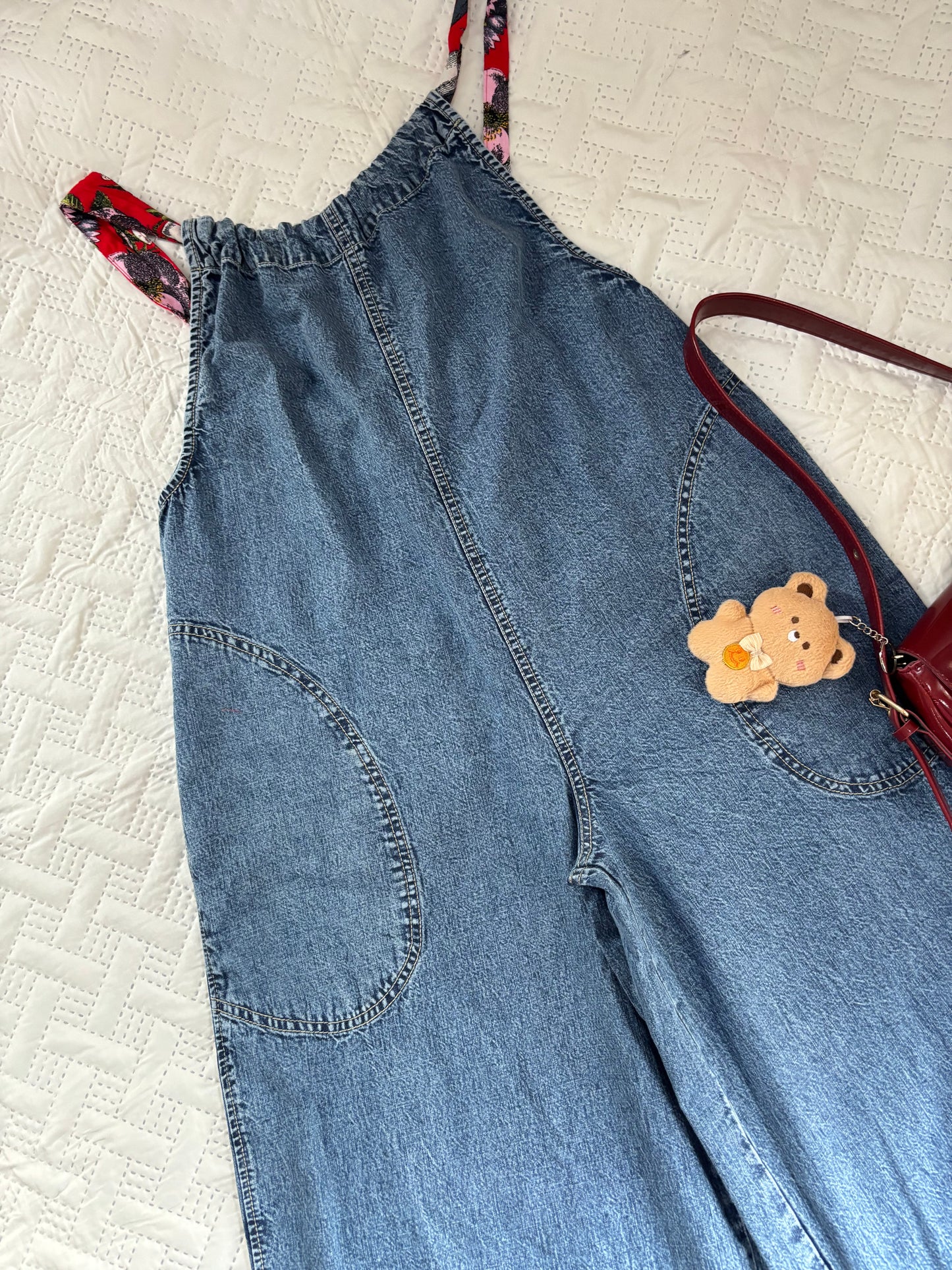 Denim jumpsuit (with red straps)